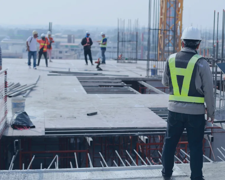 Workers at a construction site representing the building products industry