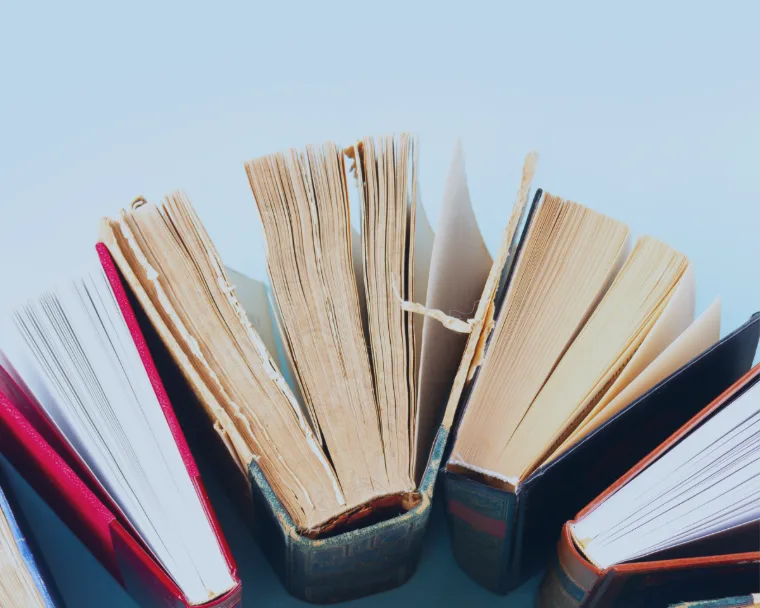 Pile of books representing the education industry