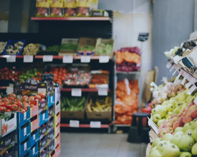 Aisles filled with groceries and products in a supermarket